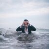 man on body of water during daytime